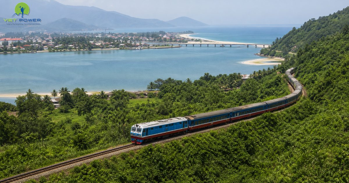 Passenger train on the Hai Van Pass coastal railway between Da Nang and Hue