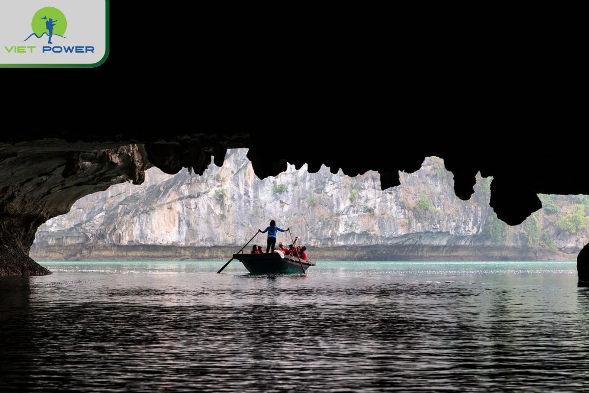 Bamboo boat ride through Dark & Light Cave
