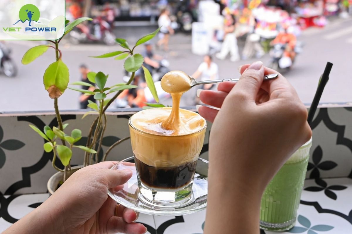 Try Egg Coffee and Watch Street Life from a Balcony Cafe